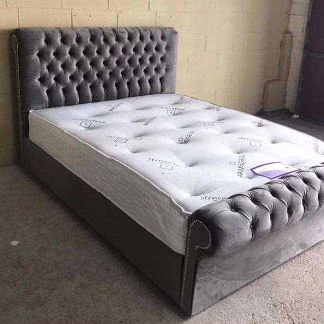 Velvet upholstered deals sleigh bed